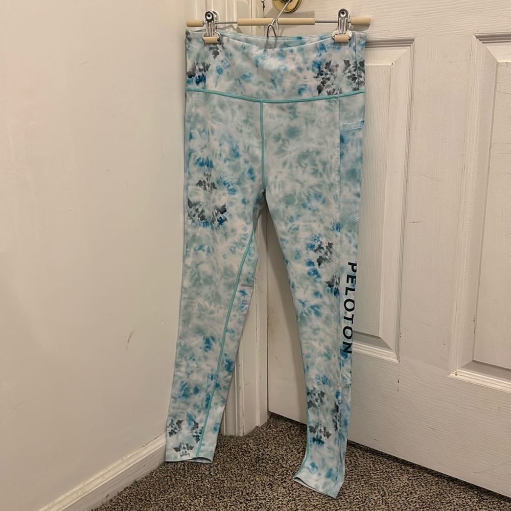 Blue and green spotted Peloton leggings size large